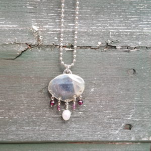 Silver and garnet coin necklace