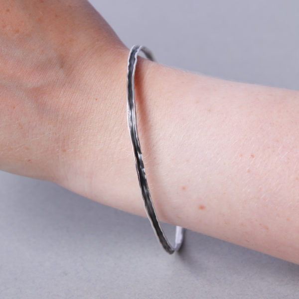 Slim silver forged bangle - Image 4