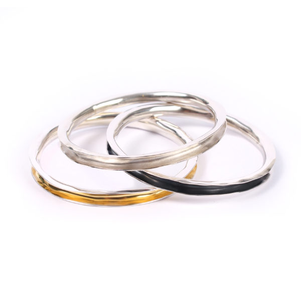 Wide silver forged bangle